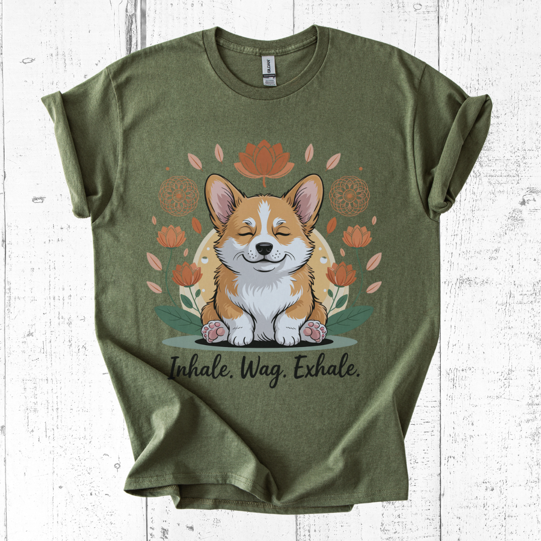 Green t-shirt with a corgi graphic and text on a wooden surface