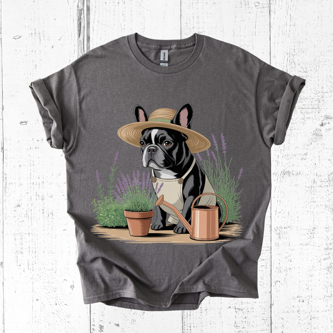 Gray t-shirt with a dog wearing a hat and gardening outfit on a white wooden background