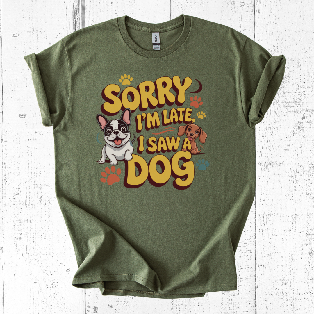 Green t-shirt with a graphic design of a dog and text on a white wooden background