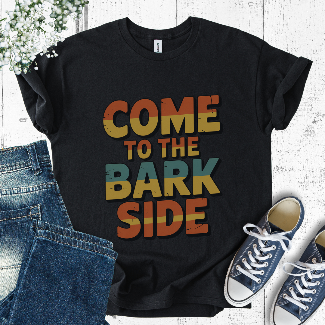 Black t-shirt with 'Come to the Bark Side' text, jeans, and sneakers on a white background