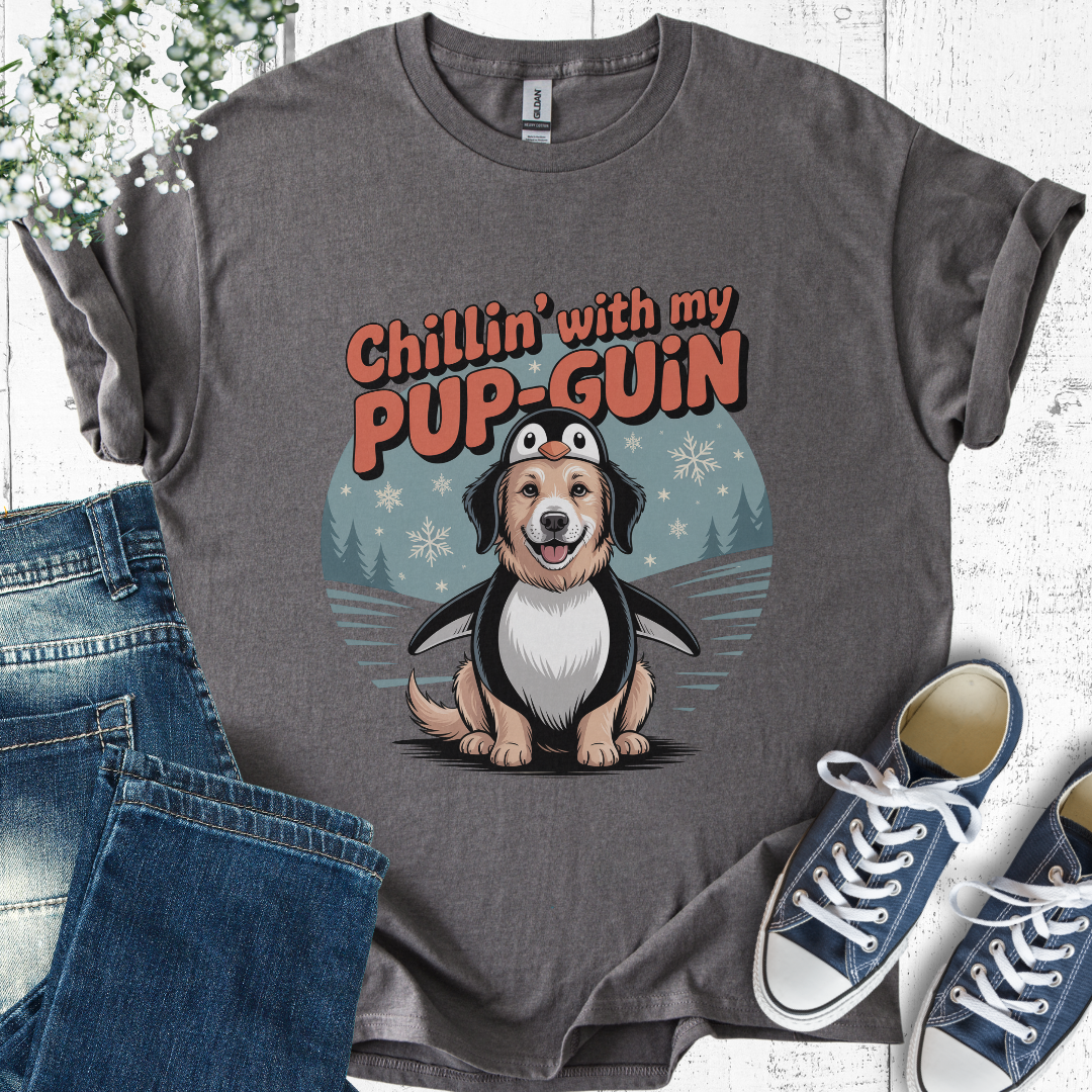 Gray t-shirt with a dog and penguin graphic and text 'Chillin' with my PUP-GUIN', displayed with jeans and sneakers.