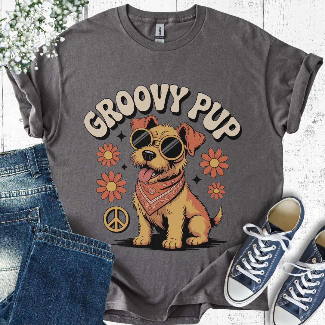 Gray t-shirt with 'Groovy Pup' design featuring a dog, flowers, and peace symbol, displayed with jeans and sneakers.