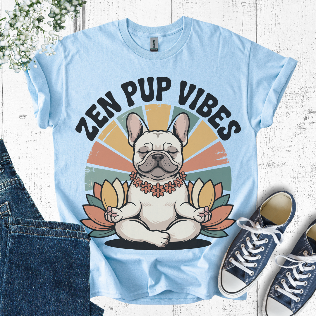 Light blue t-shirt with a dog graphic and 'Zen Pup Vibes' text on a white brick background.