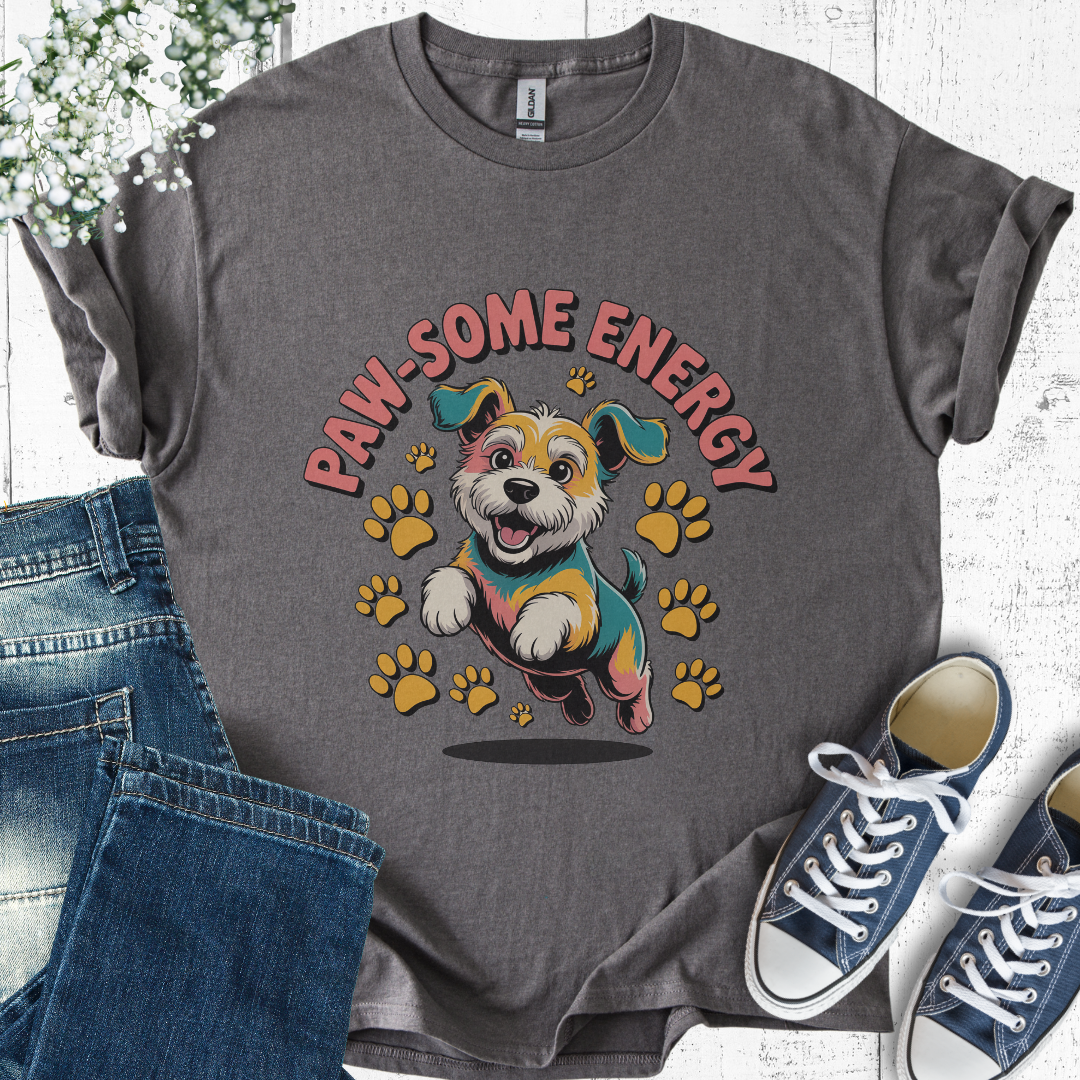 Gray t-shirt with a dog graphic and 'PAW-SOME ENERGY' text, paired with jeans and sneakers on a light wooden surface.