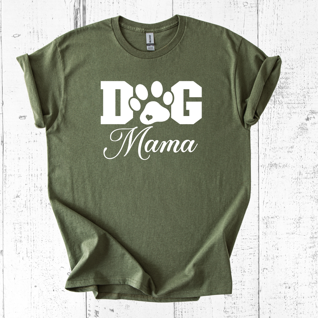 Green t-shirt with 'Dog Mama' text and paw print design on a white wooden surface