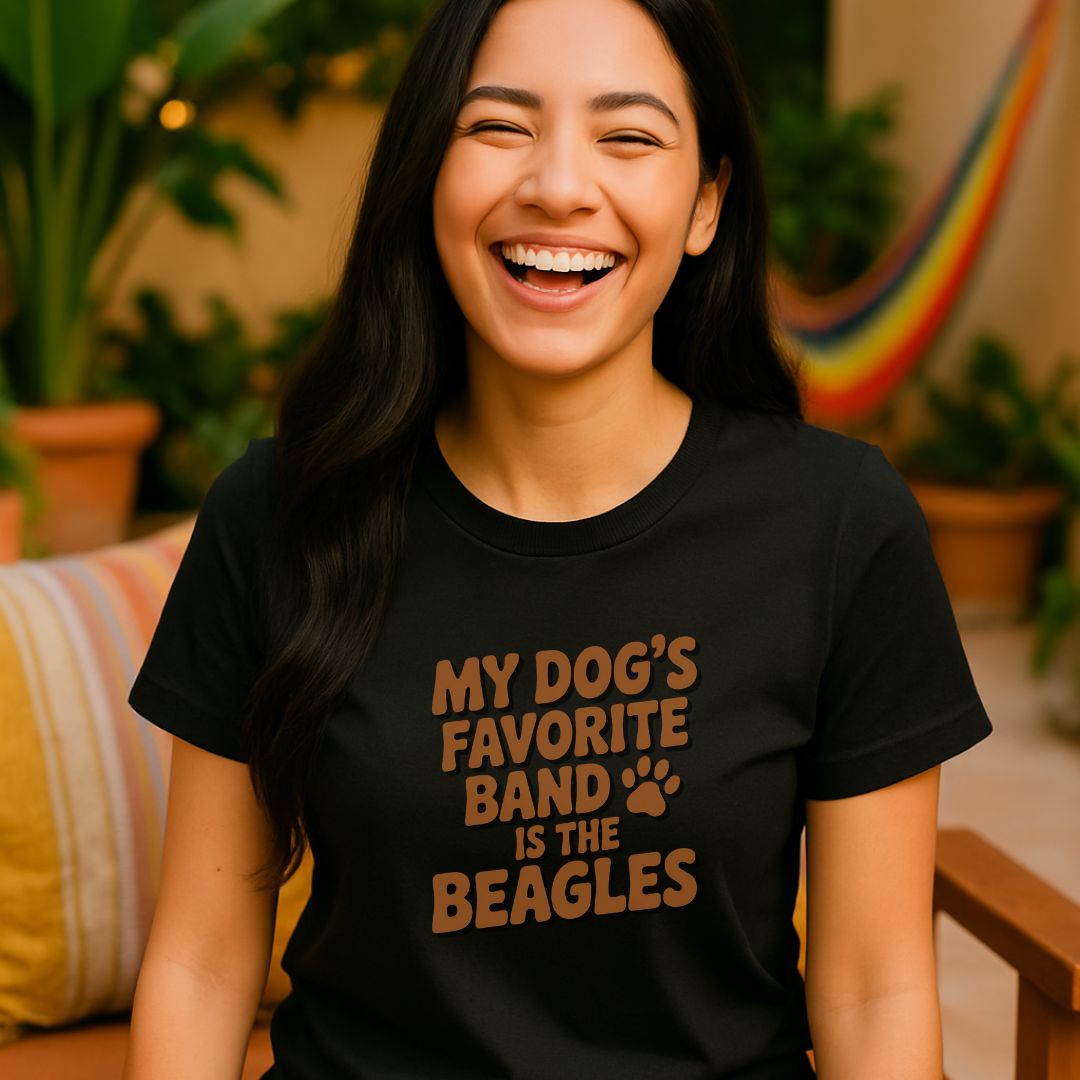 Black unisex t-shirt with retro dog graphic and ‘My Dog's Favorite Band Is The Beagles’ text, perfect for dog lovers.