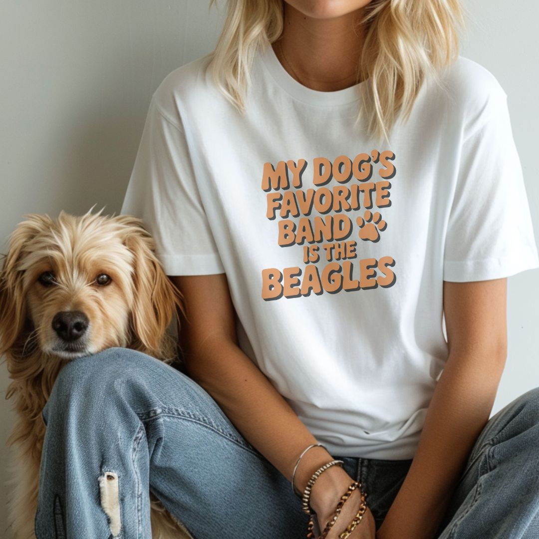 White Gildan 6400 unisex t-shirt with retro dog graphic and ‘My Dog's Favorite Band Is The Beagles’ text, perfect for dog lovers.