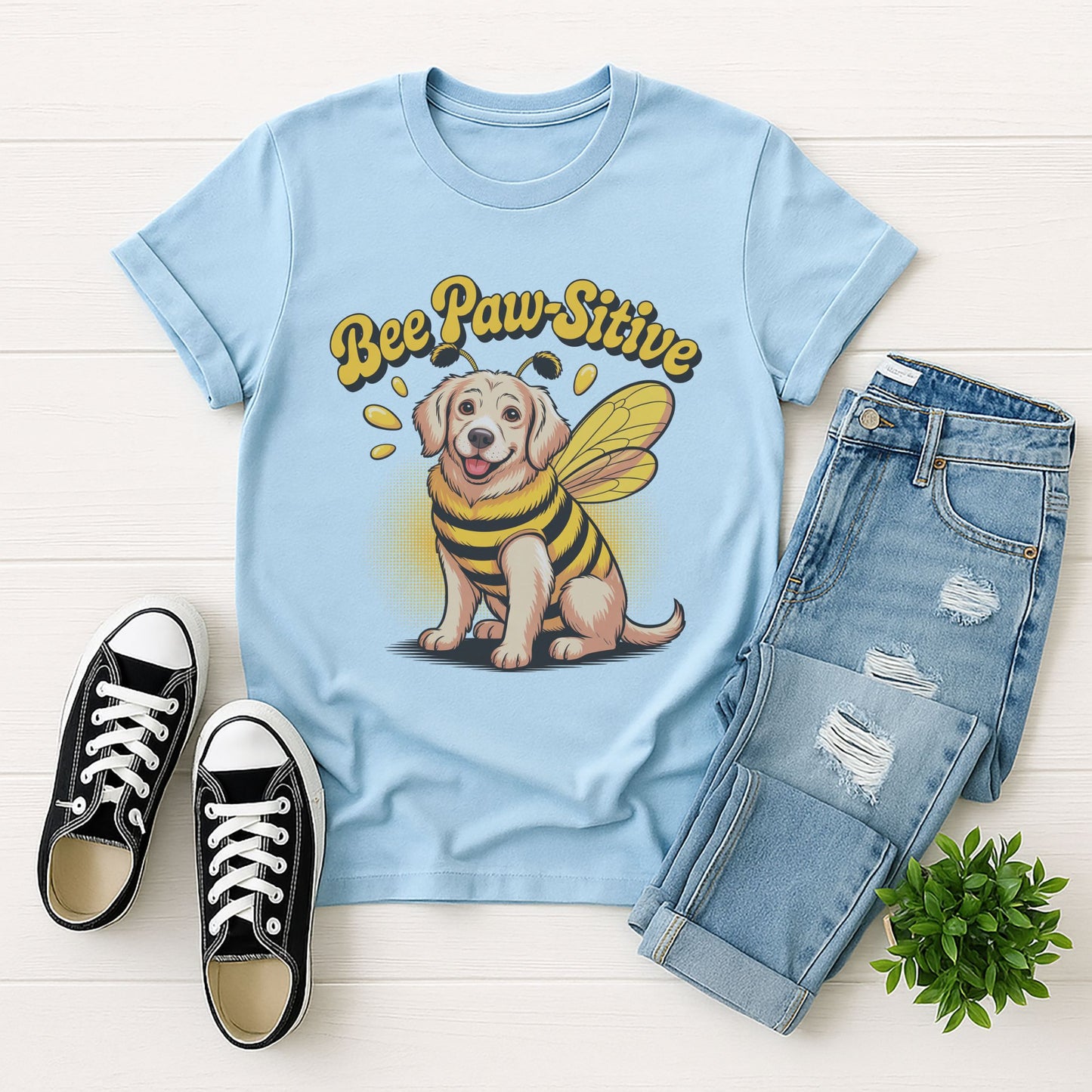 Light Blue Gildan 6400 unisex t-shirt with retro dog graphic and āBee Paw-Sitiveā text, perfect for dog lovers.