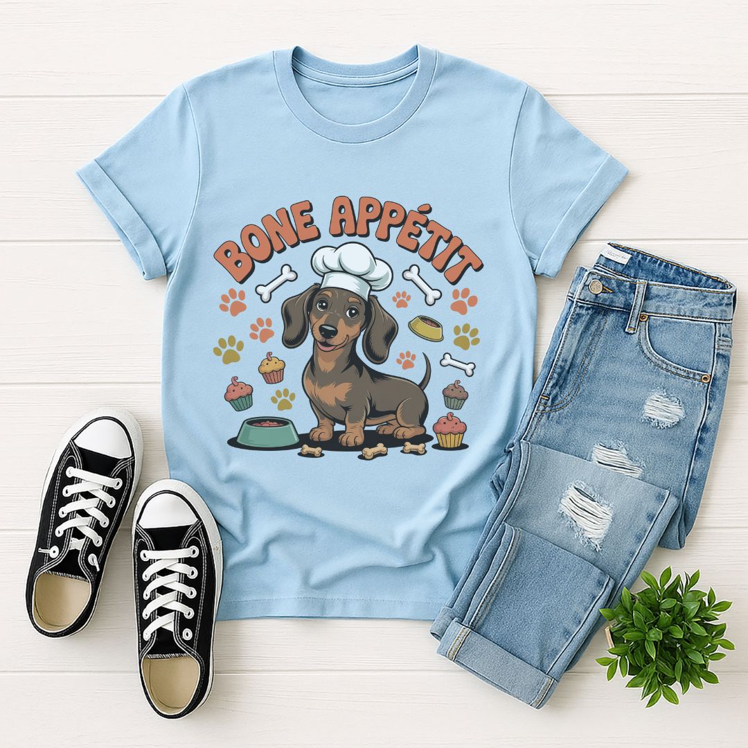 Light blue Gildan 6400 unisex t-shirt with retro dog graphic and ‘Bone Appetit' text, perfect for dog lovers.