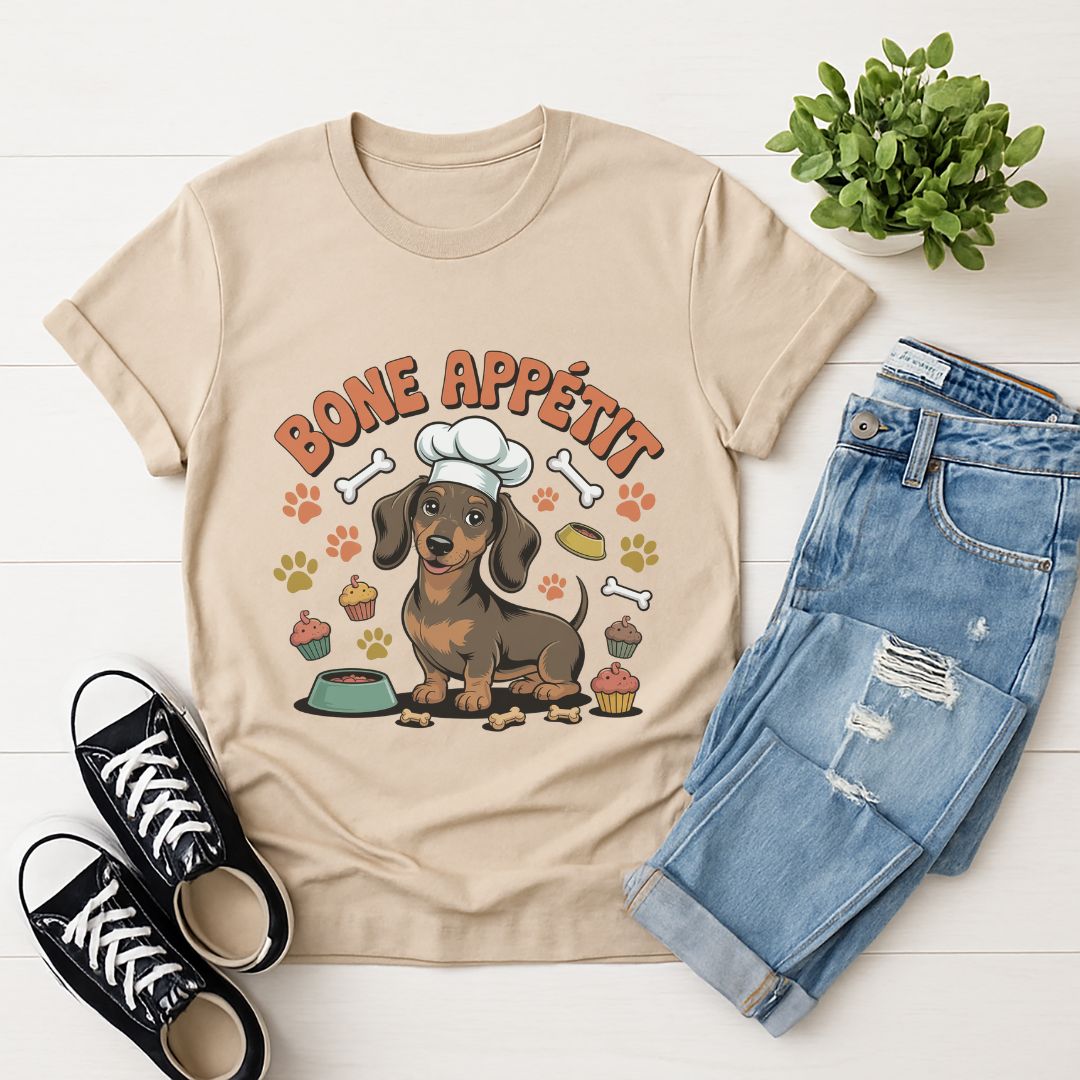 Sand Beige Gildan 6400 unisex t-shirt with retro dog graphic and ‘Bone Appetit' text, perfect for dog lovers.