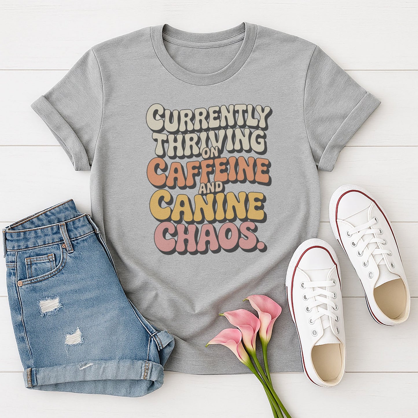Sport Gray Gildan 6400 unisex t-shirt with retro dog graphic and âCurrently Thriving On Caffeine And Canine Chaosâ text, perfect for dog lovers.