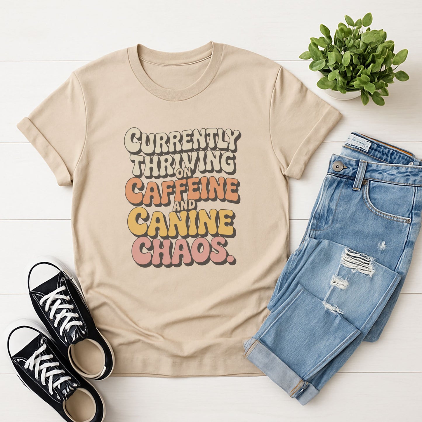 Sand Beige Gildan 6400 unisex t-shirt with retro dog graphic and âCurrently Thriving On Caffeine And Canine Chaosâ text, perfect for dog lovers.