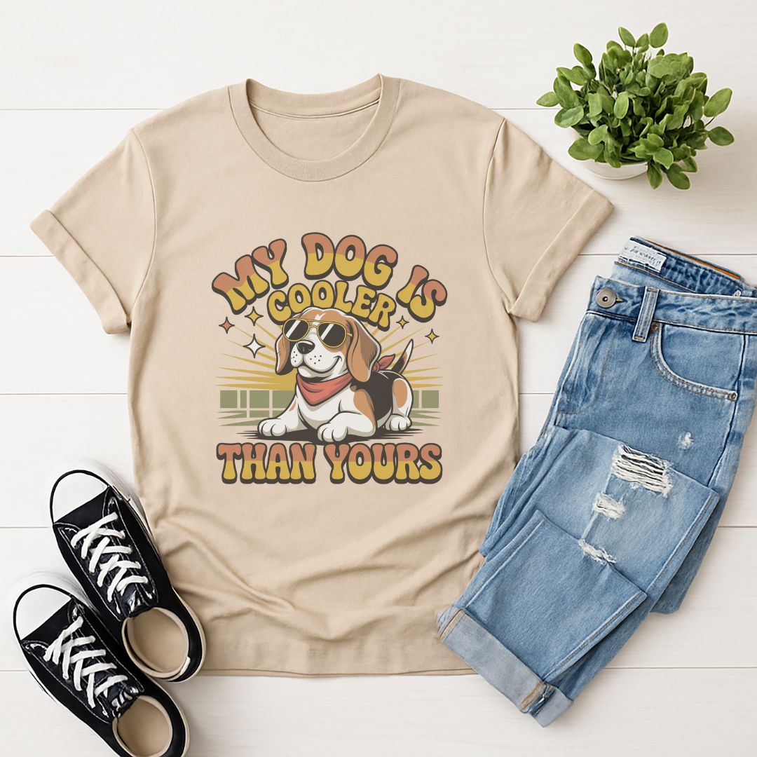 Sand Beige Gildan 6400 unisex t-shirt with retro dog graphic and ‘My Dog Is Cooler Than Yours’ text, perfect for dog lovers.