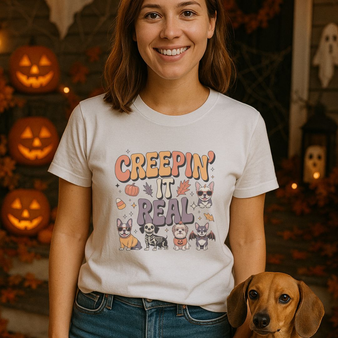 Unisex t-shirt with retro dog graphic and ‘Creepin' It Real' text, perfect for dog lovers.