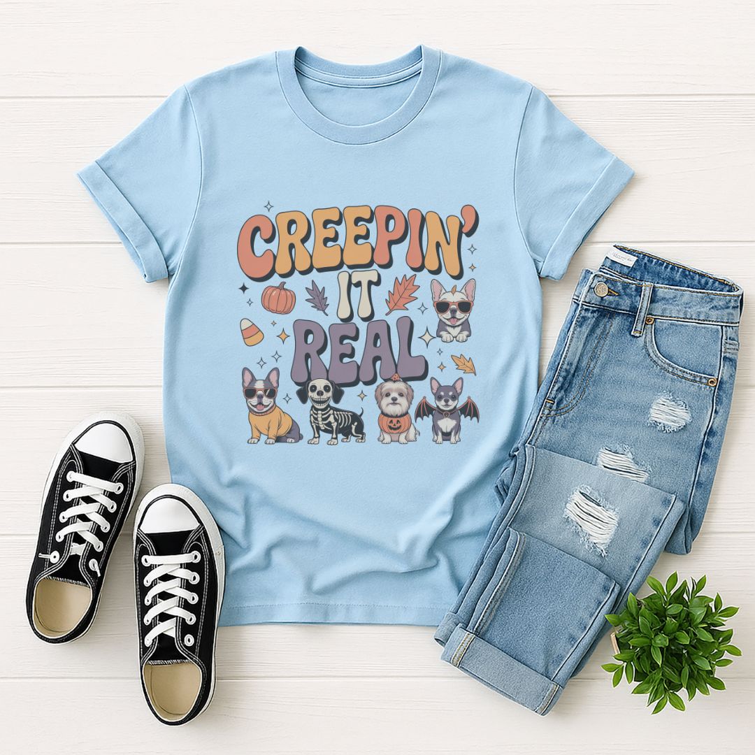 Light blue Gildan 6400 unisex t-shirt with retro dog graphic and ‘Creepin' It Real' text, perfect for dog lovers.