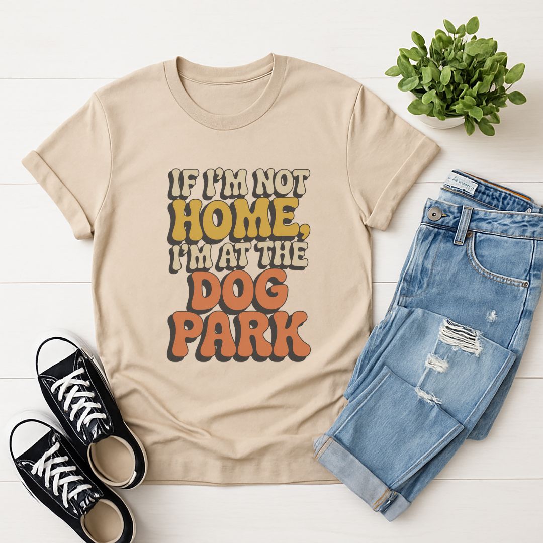 Sand Beige Gildan 6400 unisex t-shirt with retro dog graphic and ‘If I'm Not Home, I'm At The Dog Park’ text, perfect for dog lovers.