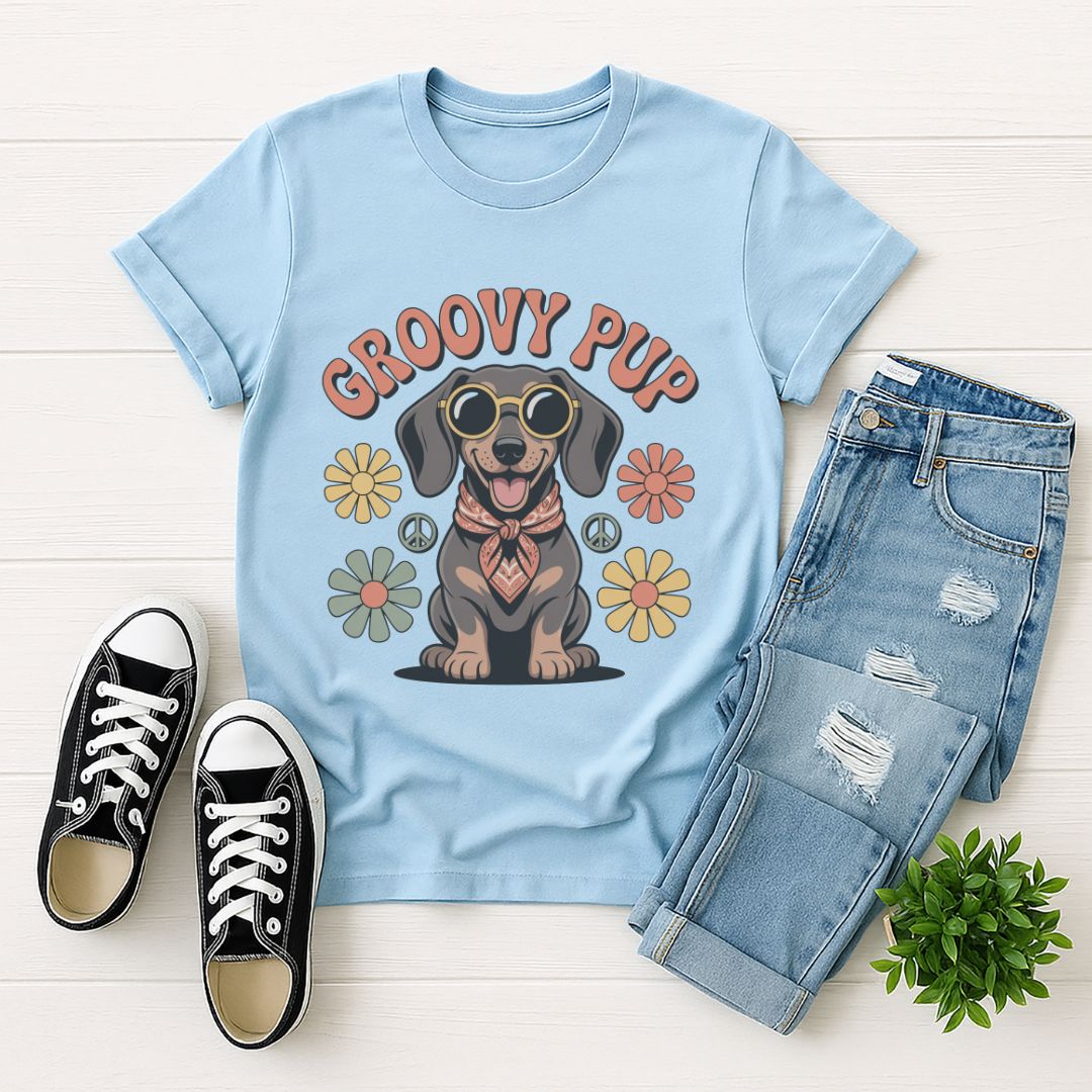 Light Blue Gildan 6400 unisex t-shirt with retro dog graphic and ‘Groovy Pup’ text, perfect for dog lovers.