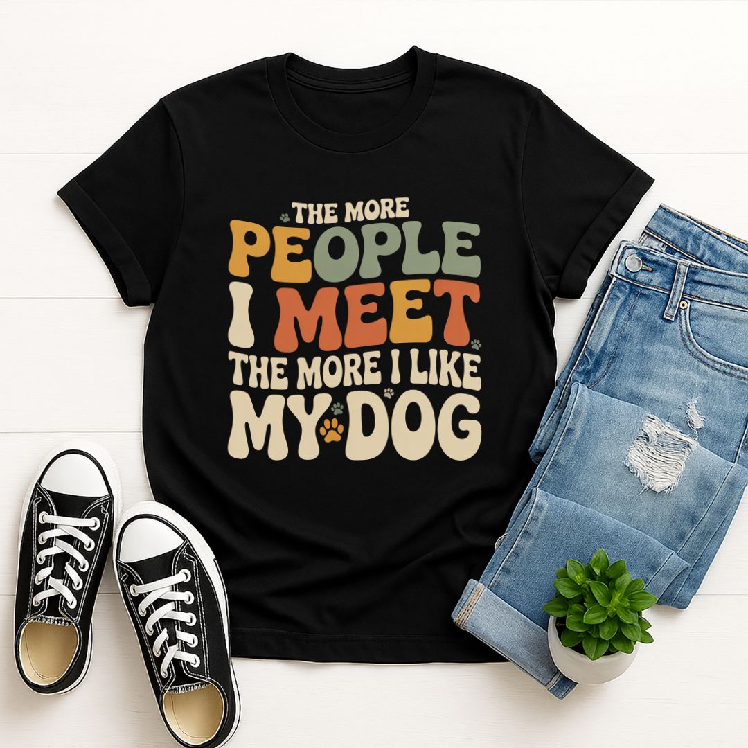 Black Gildan 6400 unisex t-shirt with retro dog graphic and ‘The More People I Meet The More I Like My Dog’ text, perfect for dog lovers.