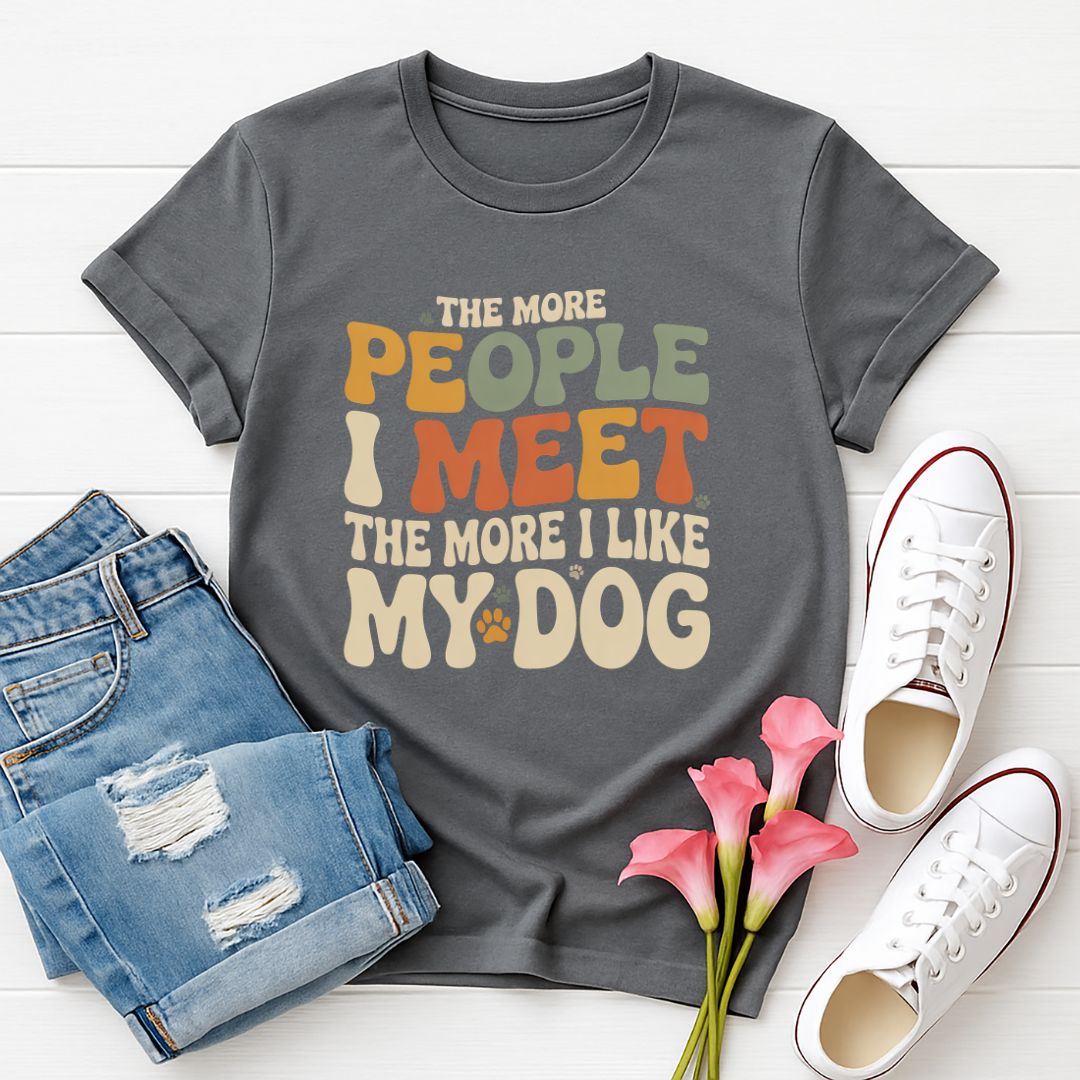 Charcoal Gray Gildan 6400 unisex t-shirt with retro dog graphic and ‘The More People I Meet The More I Like My Dog’ text, perfect for dog lovers.