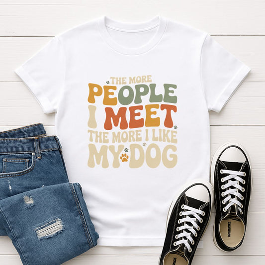 White Gildan 6400 unisex t-shirt with retro dog graphic and โThe More People I Meet The More I Like My Dogโ text, perfect for dog lovers.