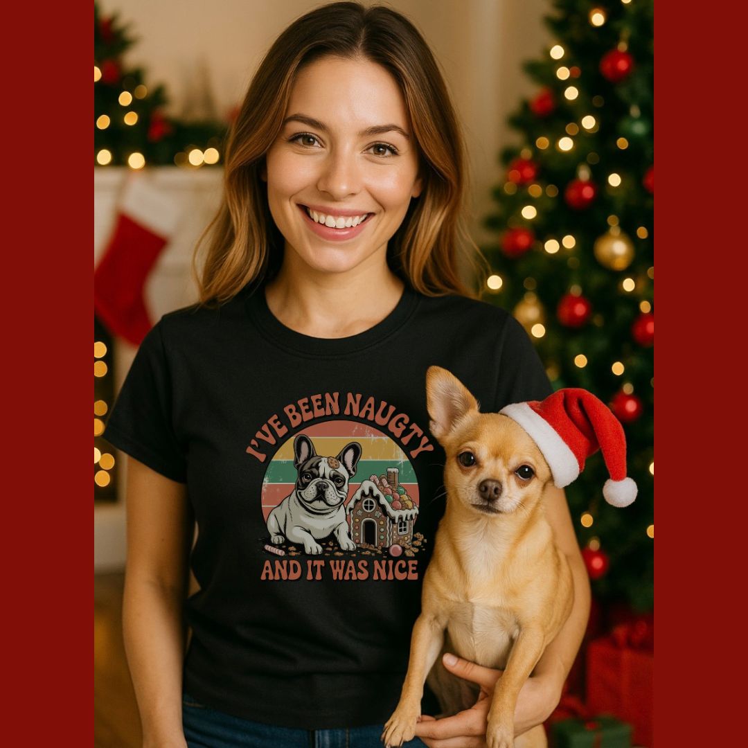 Black unisex t-shirt with retro dog graphic and ‘I've Been Naughty And It Was Nice' text, perfect for dog lovers.