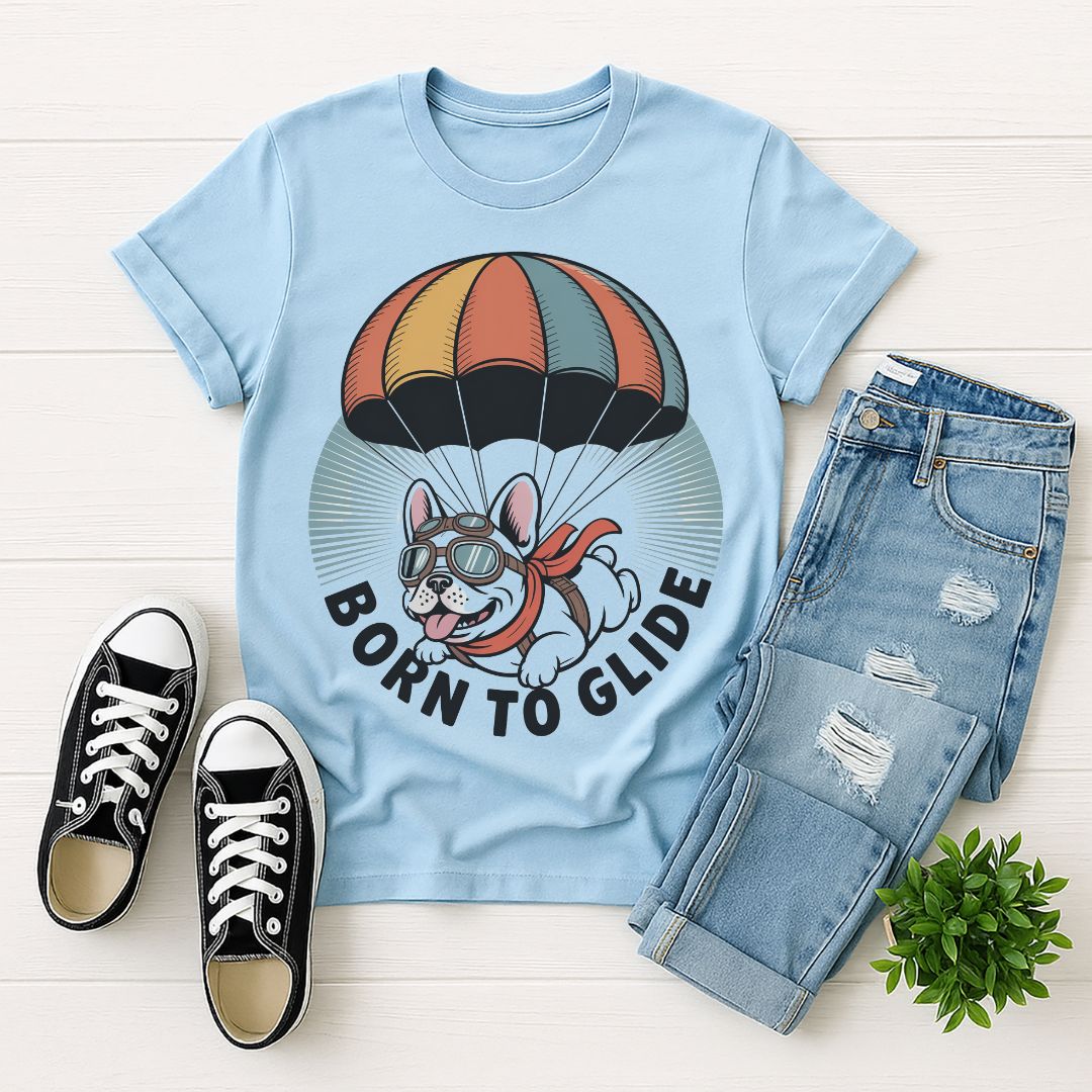 Light blue Gildan 6400 unisex t-shirt with retro dog graphic and ‘Born To Glide.’ text, perfect for dog lovers.