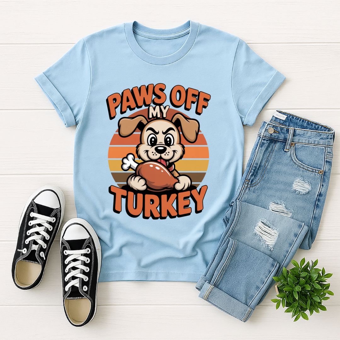 Light Blue Gildan 6400 unisex t-shirt with retro dog graphic and ‘Paws Off My Turkey’ text, perfect for dog lovers.