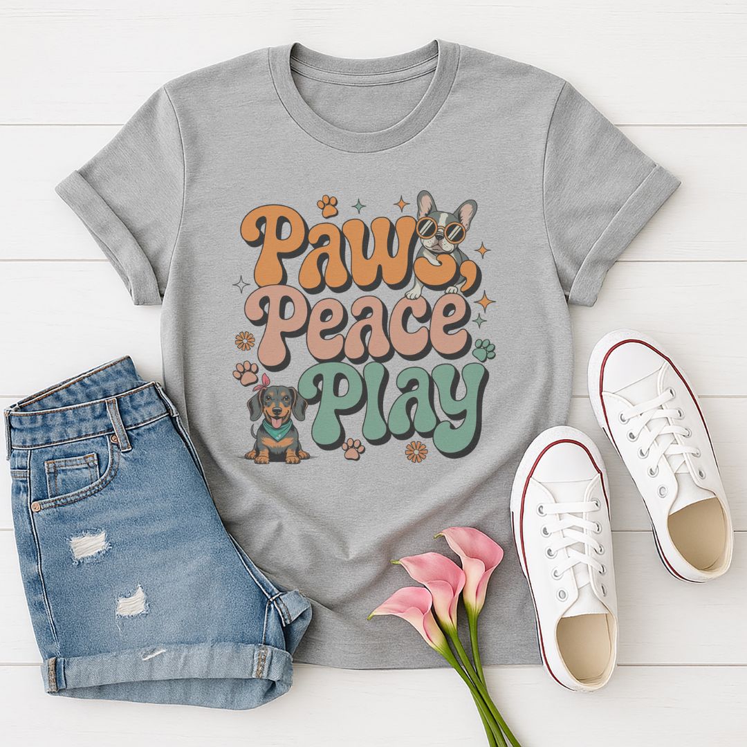 Sport Gray Gildan 6400 unisex t-shirt with retro dog graphic and ‘Paws, Peace, Play' text, perfect for dog lovers.