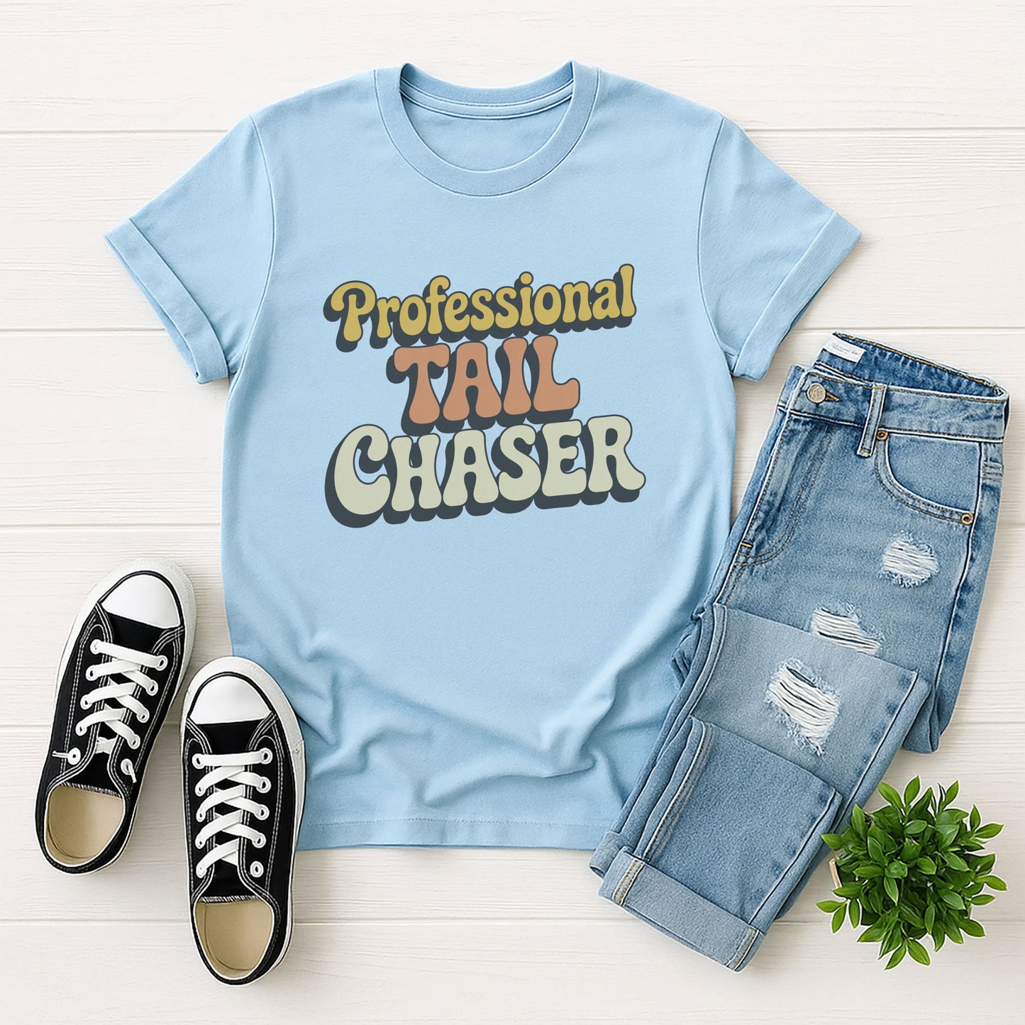 Light Blue Gildan 6400 unisex t-shirt with retro dog graphic and āProfessional Tail Chaserā text, perfect for dog lovers.