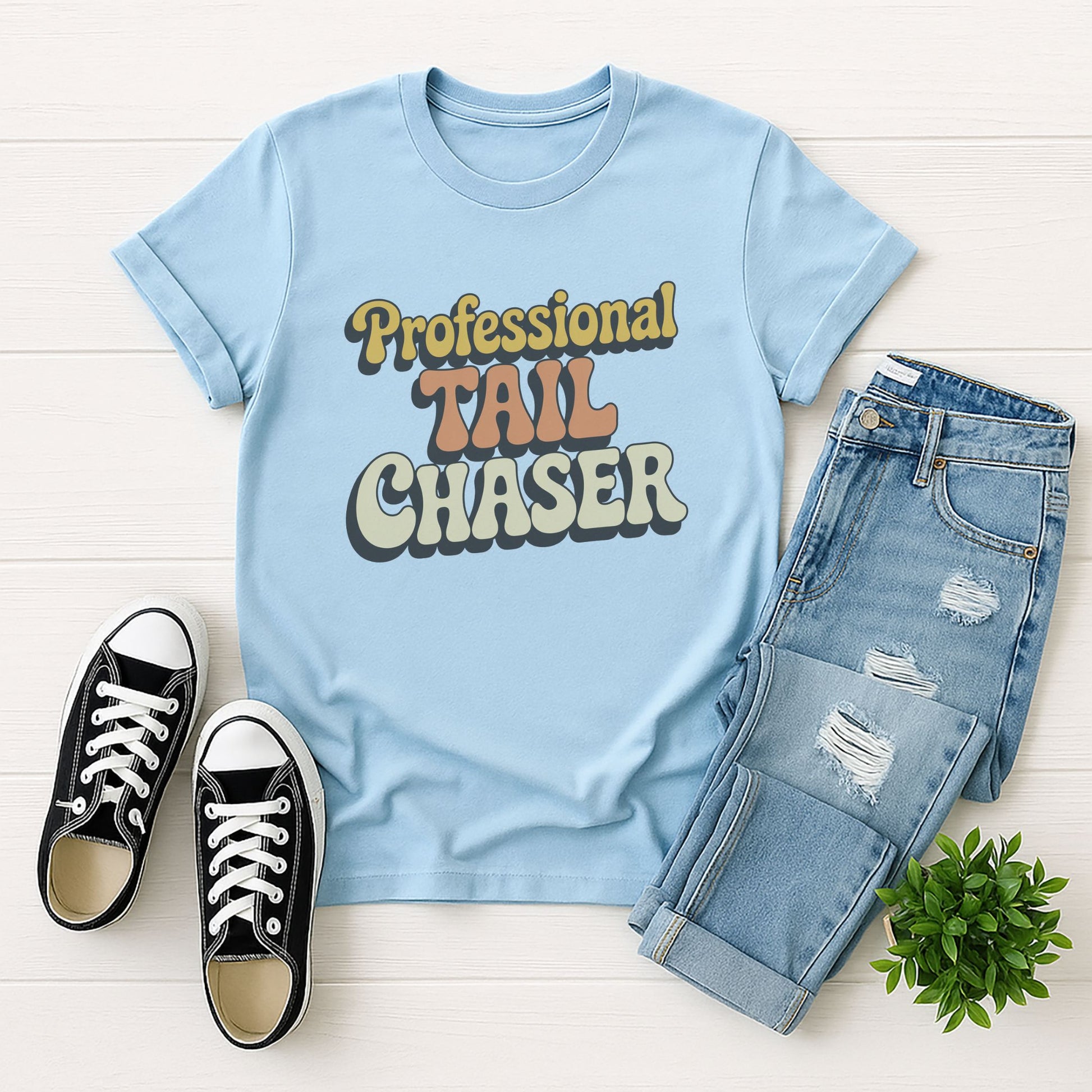 Light Blue Gildan 6400 unisex t-shirt with retro dog graphic and āProfessional Tail Chaserā text, perfect for dog lovers.
