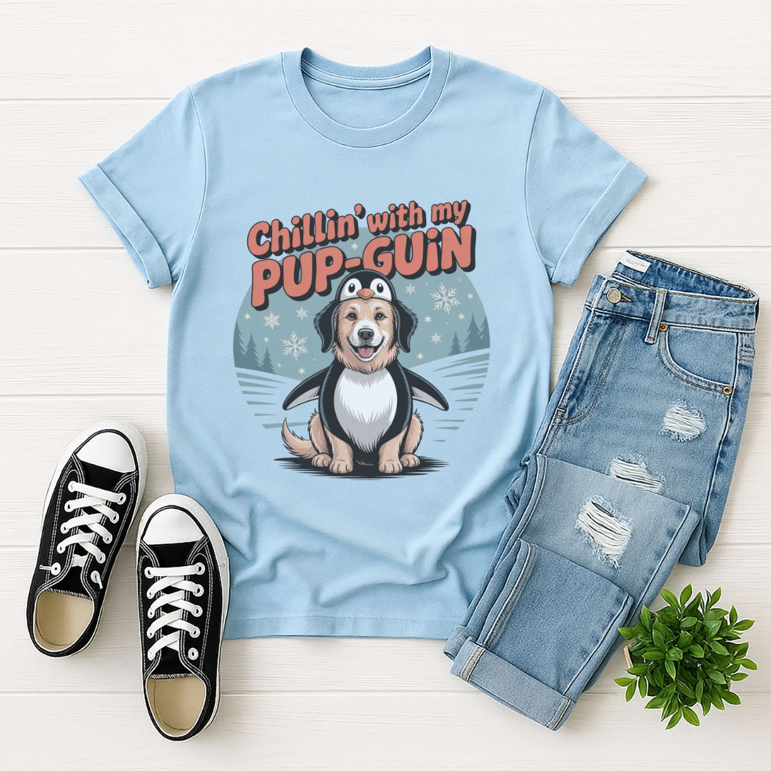 Light Blue Gildan 6400 unisex t-shirt with retro dog graphic and ‘Chillin' with my PUP-GUIN’ text, perfect for dog lovers.