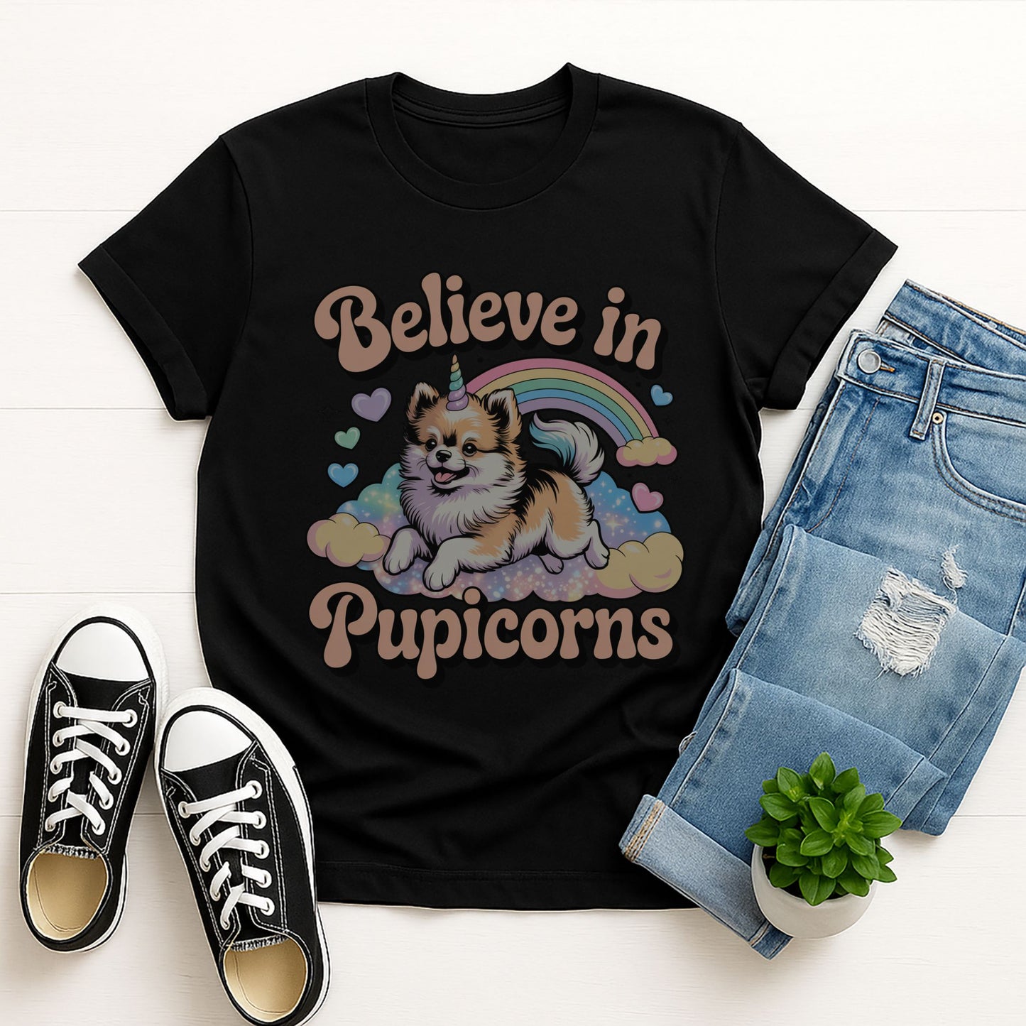 Black Gildan 6400 unisex t-shirt with retro dog graphic and ‘Believe in Pupicorns’ text, perfect for dog lovers.