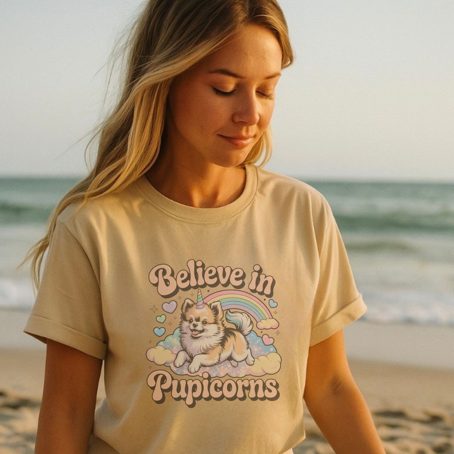 Sand Beige unisex t-shirt with retro dog graphic and ‘Believe in Pupicorns’ text, perfect for dog lovers.