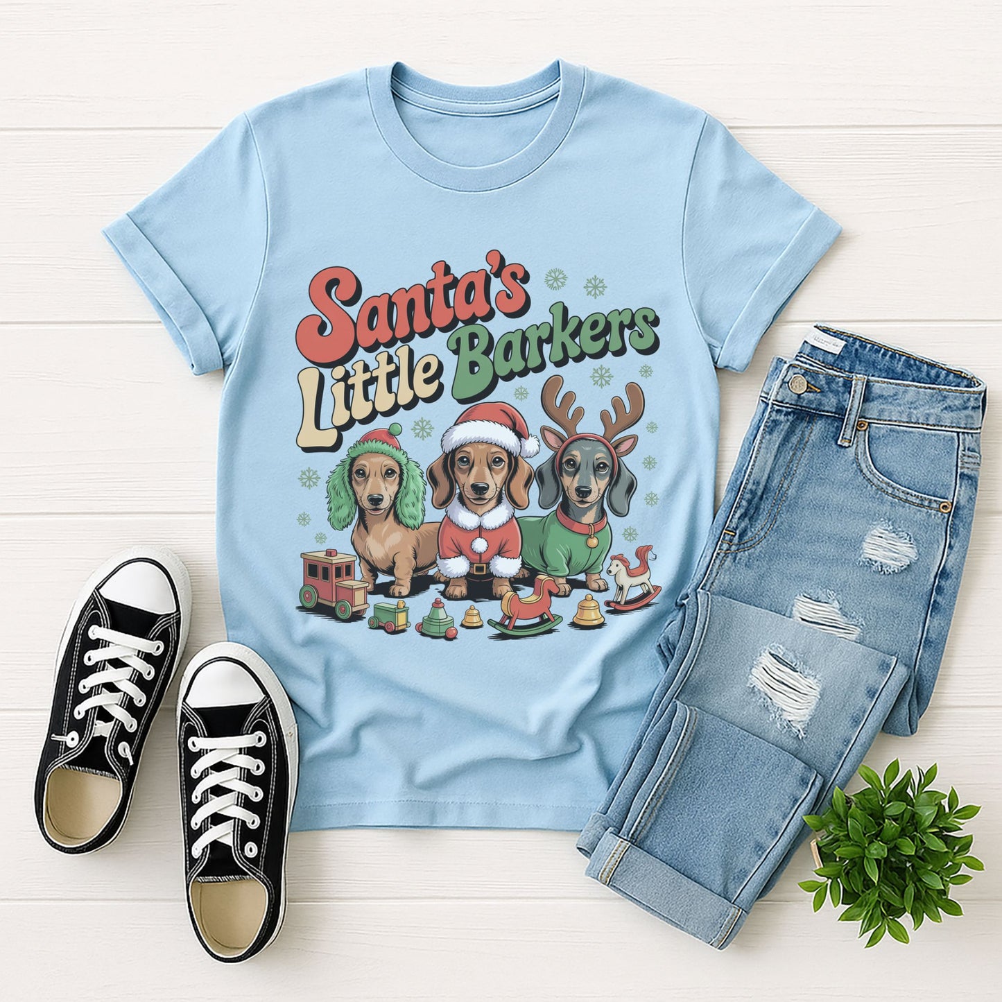 Light blue Gildan 6400 unisex t-shirt with retro dog graphic and ‘Santa's Little Barkers' text, perfect for dog lovers.