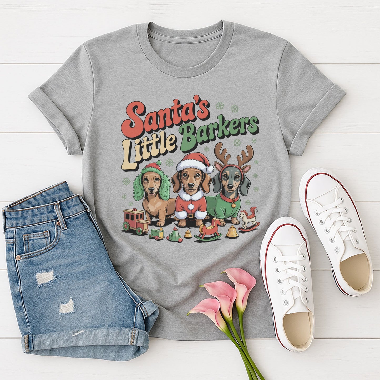 Sport Gray Gildan 6400 unisex t-shirt with retro dog graphic and ‘Santa's Little Barkers' text, perfect for dog lovers.