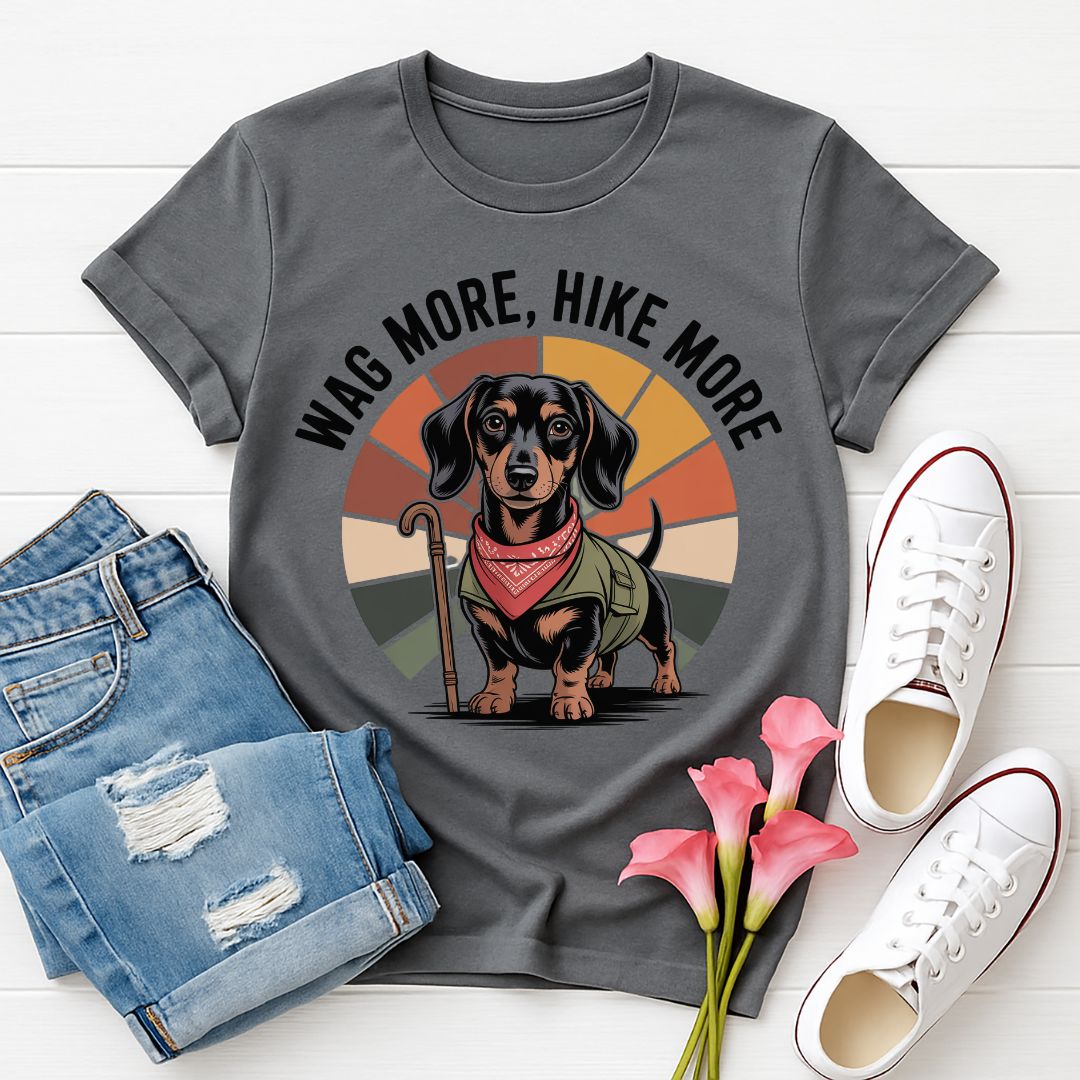 Charcoal Gray Gildan 6400 unisex t-shirt with retro dog graphic and ‘Wag More, Hike More.’ text, perfect for dog lovers.