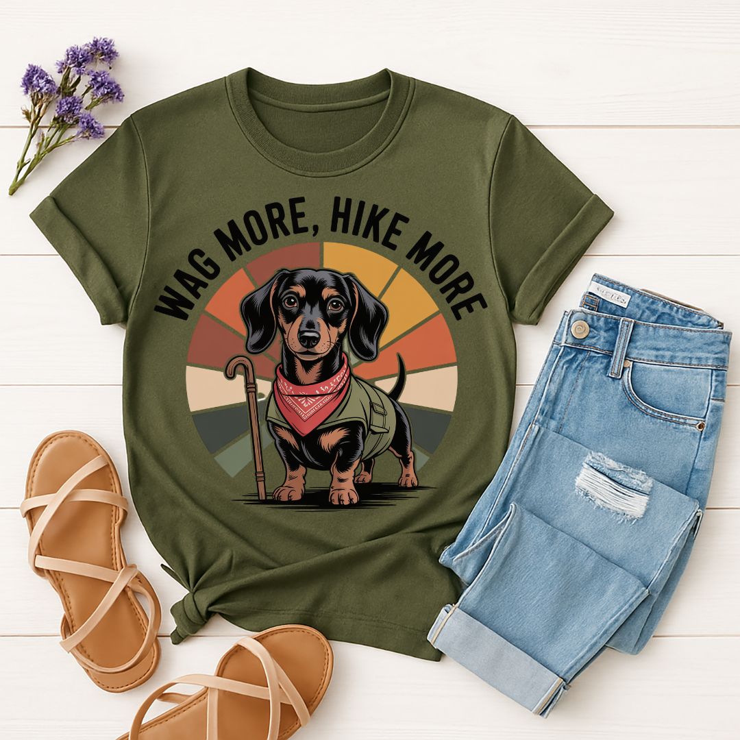Military Green Gildan 6400 unisex t-shirt with retro dog graphic and ‘Wag More, Hike More.’ text, perfect for dog lovers.