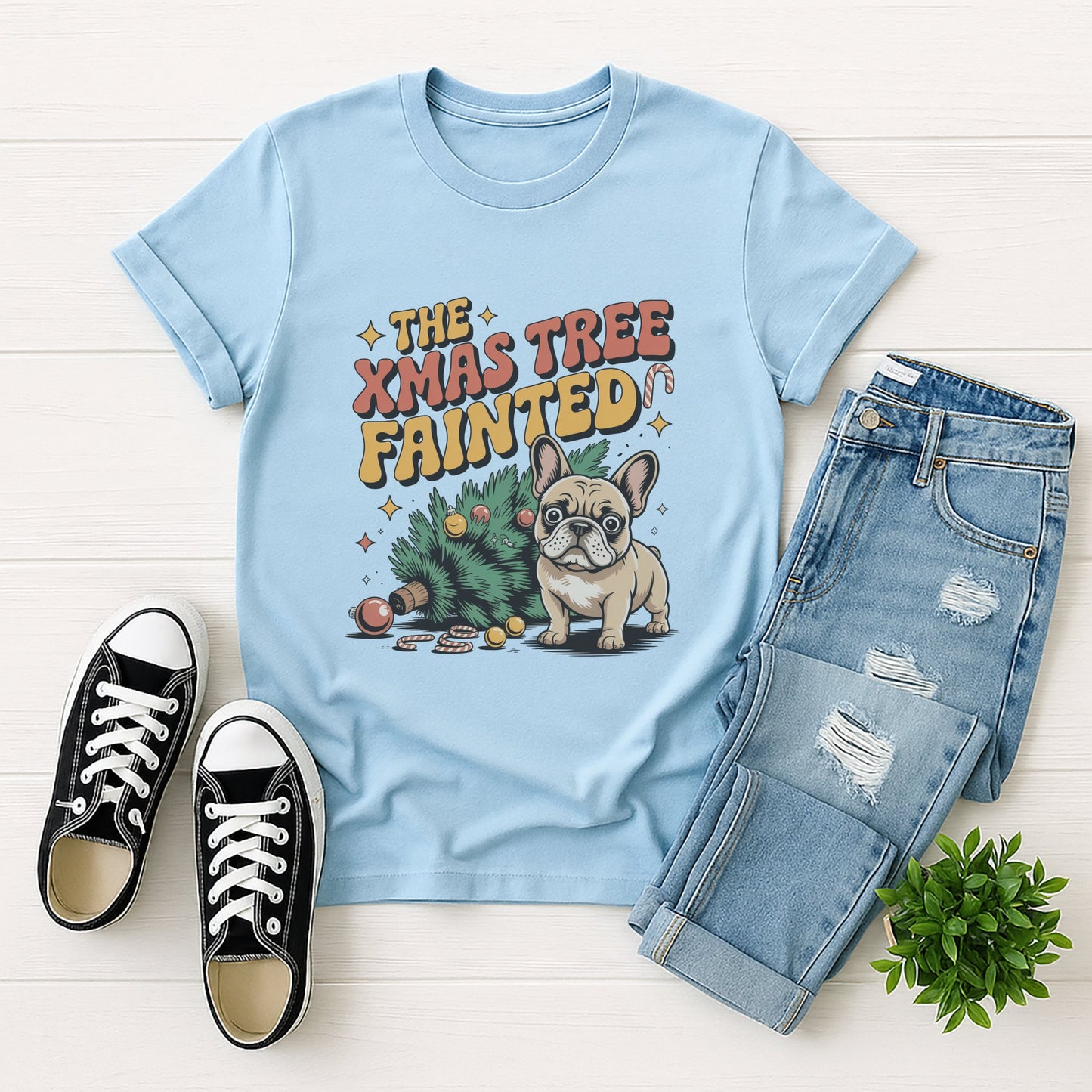 Light blue Gildan 6400 unisex t-shirt with retro dog graphic and ‘The Xmas Tree Fainted' text, perfect for dog lovers.