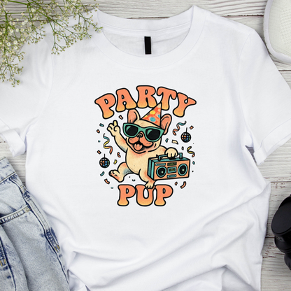 White t-shirt with 'Party Pup' design featuring a dog with sunglasses and a boombox on a wooden surface.