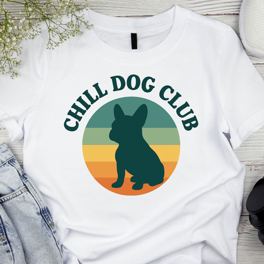 White t-shirt with 'Chill Dog Club' graphic featuring a dog silhouette on a colorful background.