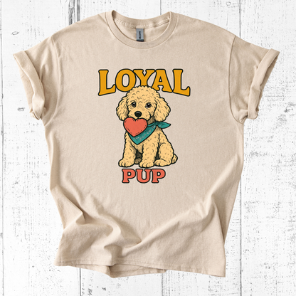 Beige t-shirt with a dog graphic and 'Loyal Pup' text on a white wooden background