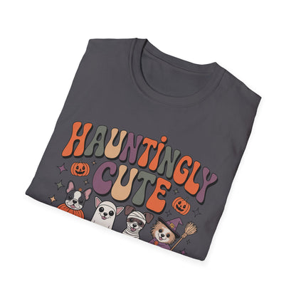 Folded t-shirt with 'Hauntingly Cute' text and Halloween-themed graphics on a white background