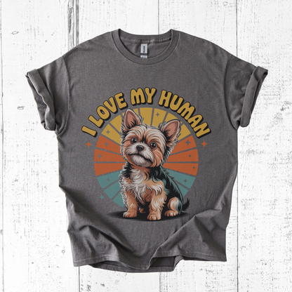 Gray t-shirt with a dog graphic and 'I Love My Human' text on a wooden surface