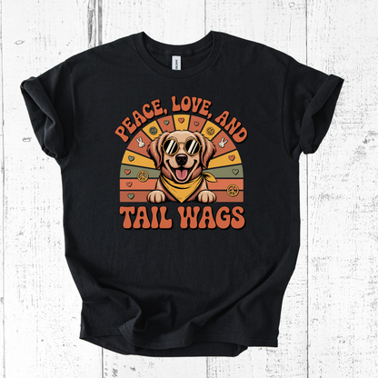 Black t-shirt with a dog graphic and 'Peace, Love, and Tail Wags' text on a white wooden background