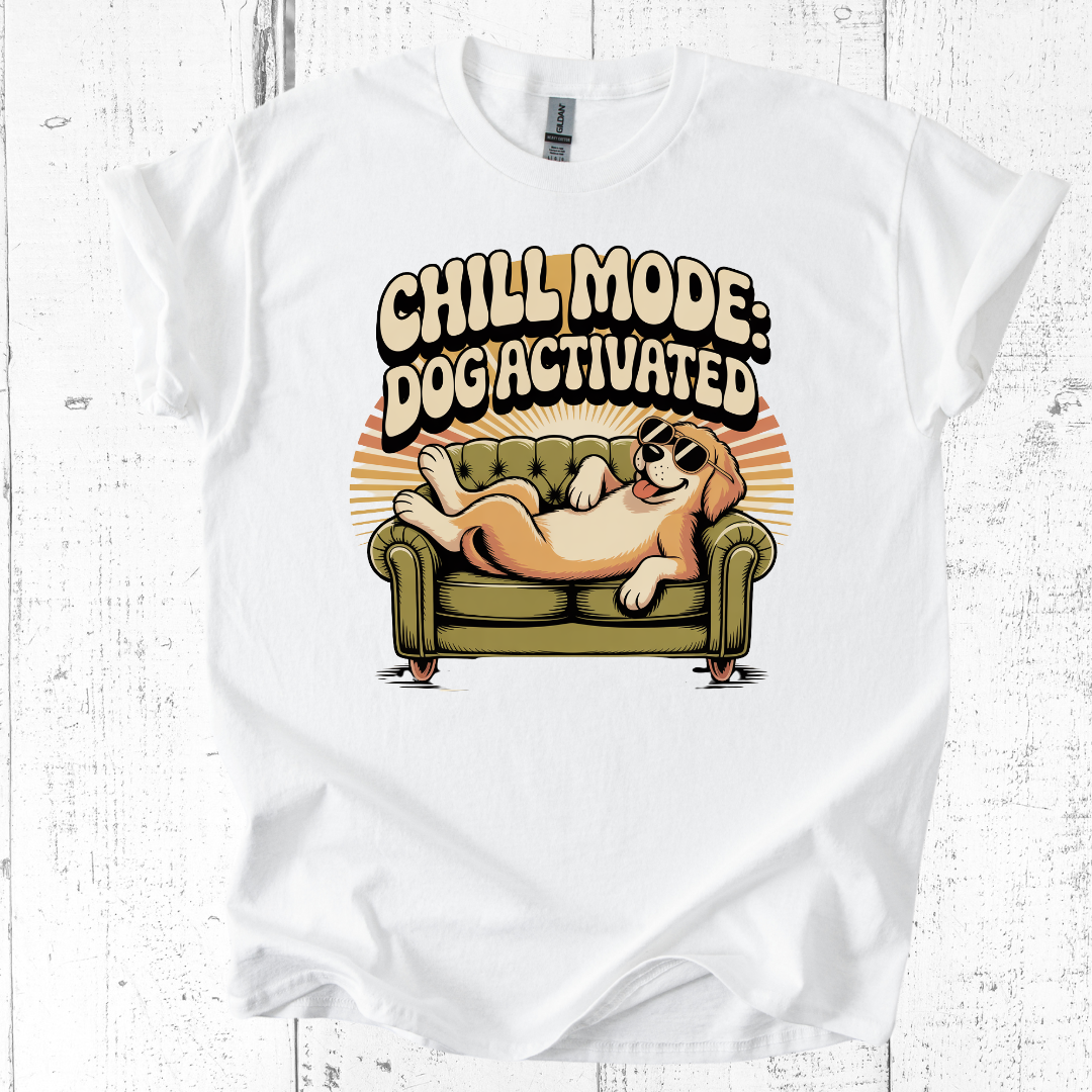 White t-shirt with a graphic of a dog on a couch and text 'Chill Mode: Dogactivated' on a white background.