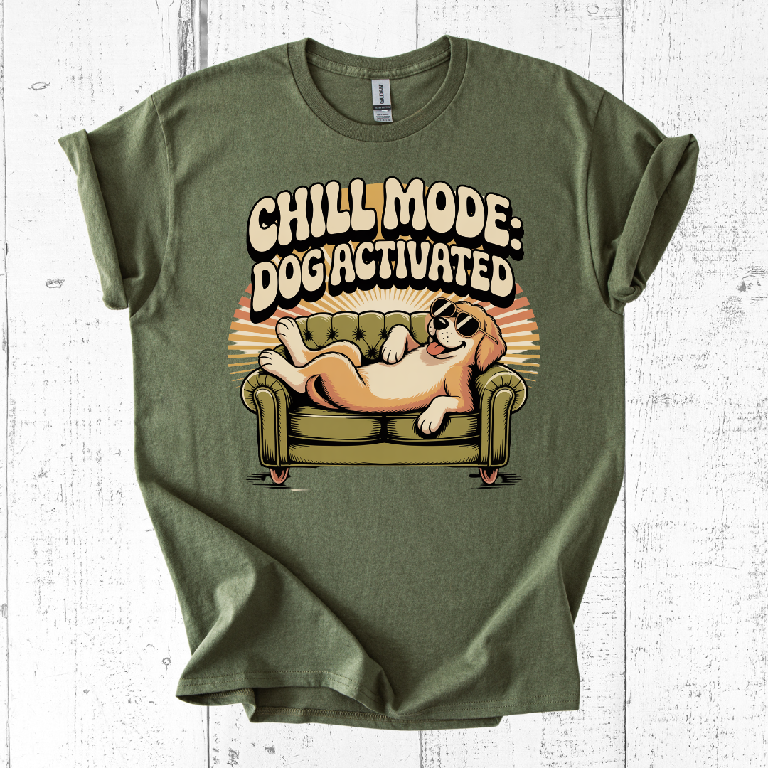 Military Green t-shirt with a dog graphic and 'Chill Mode: Dog Activated' text on a white wooden background