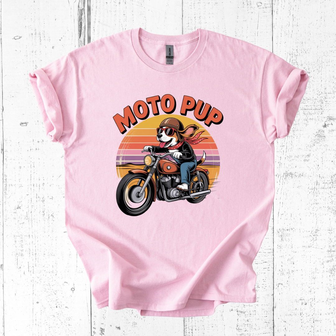 Pink t-shirt with 'Moto Pup' graphic on a white wooden background
