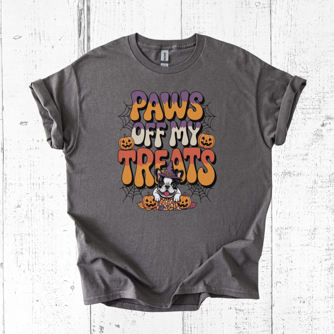 Gray t-shirt with Halloween-themed design featuring text 'Paws Off My Treats' on a white wooden background.