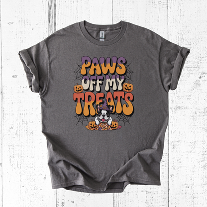 Gray t-shirt with Halloween-themed design featuring text 'Paws Off My Treats' on a white wooden background.