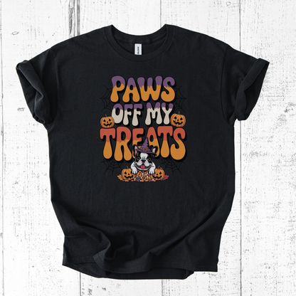 Black t-shirt with Halloween-themed design featuring a dog and text on a white wooden background